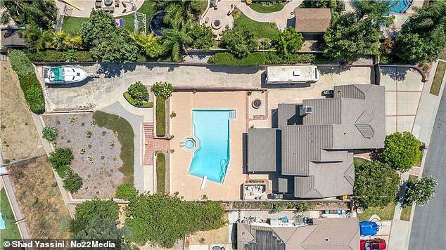 The 16,000-square-foot Simi Valley home – located north of Thousand Oaks and Malibu – has four bedrooms and two and a half bathrooms