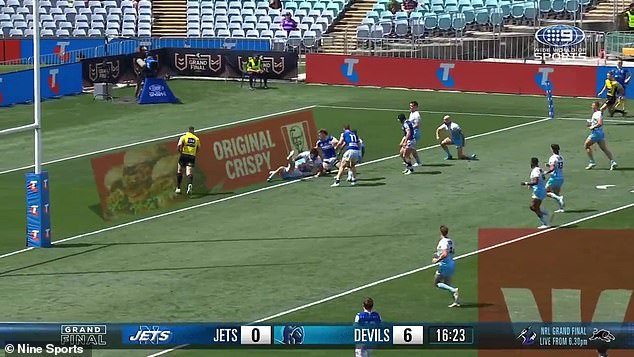 Channel 9's broadcast shows the virtual adverts for KFC and Westpac which fans on the ground cannot see