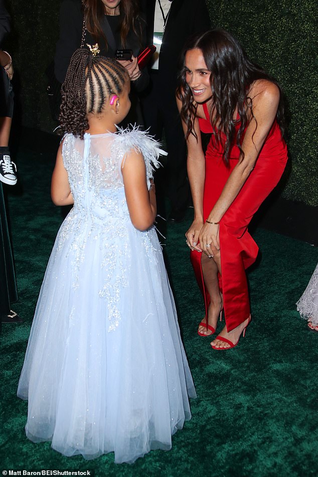 Markle was spotted greeting a young fan at the LA Children's Hospital gala on Saturday night