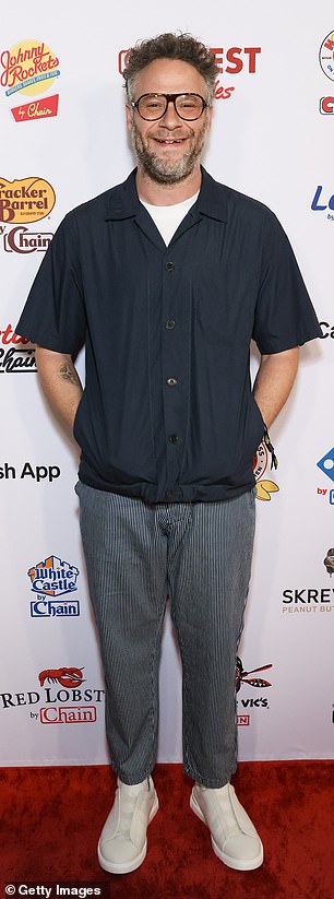 Seth Rogen was cheerful as he attended the dinner party in pinstripe sweatpants and a dark short-sleeved shirt