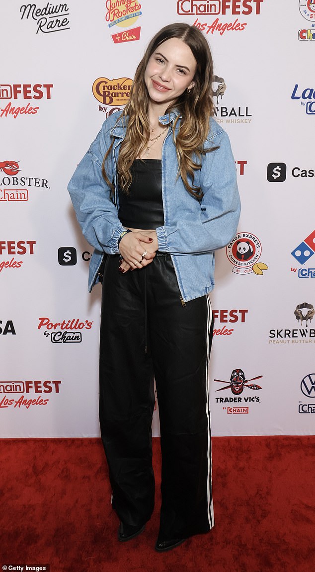 Internet personality Bobbi Althoff took black sweatpants to the next level and added a light wash denim bomber jacket