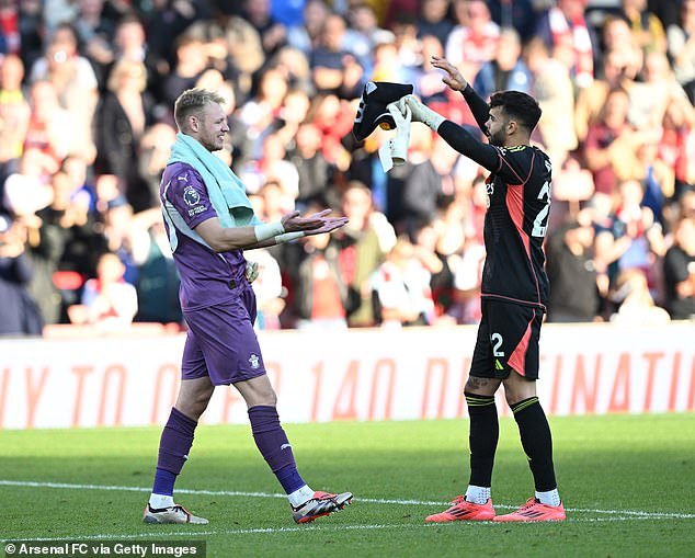 Goalkeepers Ramsdale (left) and David Raya (right) hugged after Arsenal's 3-1 win