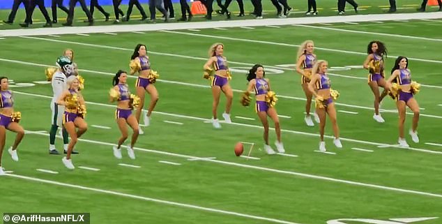 As he was setting up a field goal attempt, the Vikings cheerleaders approached him