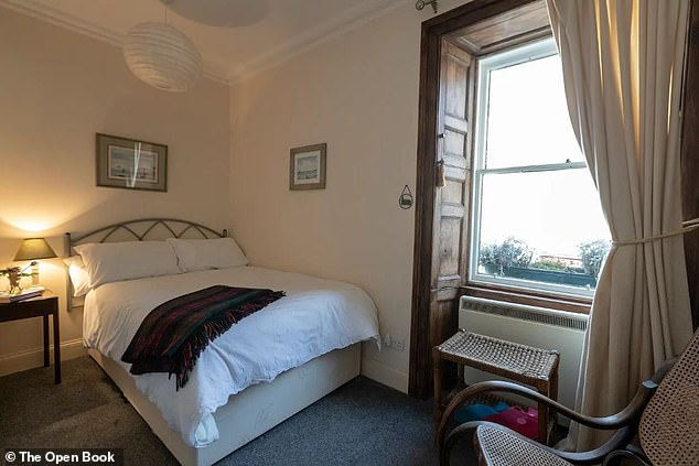 This unique rental property has a staggering two-year waiting list for the chance to stay in the self-contained flat above the shop, which features a bathroom, bedroom, lounge, kitchen and dining room