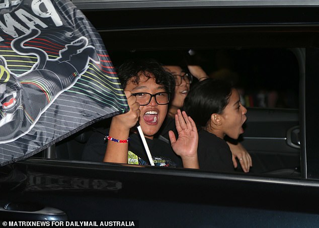 Many of the partygoers also waved the iconic Penrith flag, which features the legendary western Sydney panther