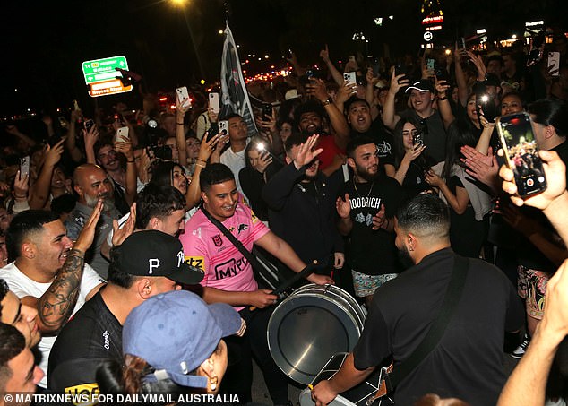 The man with the big drum kept the beat going as his fellow fans partied hard in Penrith