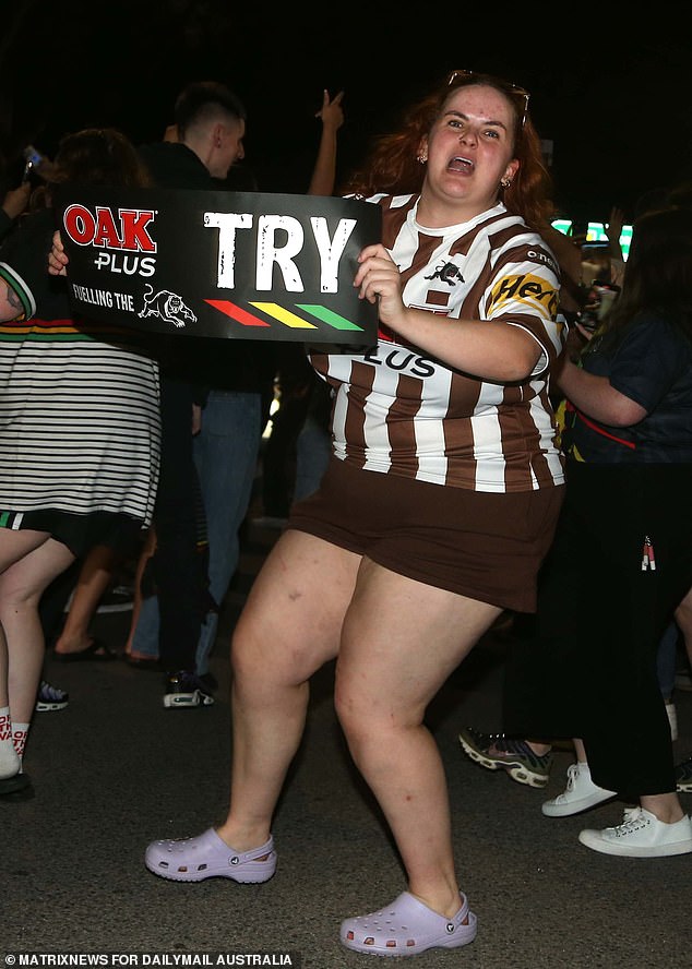 A seasoned Penrith is pictured holding the try sign she no doubt held aloft for each of the Panthers' three tries