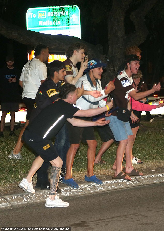 Shorts proved popular for many young men on a balmy spring evening in Sydney's west