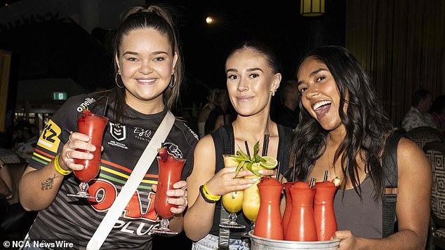 Holly Munday, Bella White and Annlin Biju enjoyed watching the grand final at the Panthers Rugby Leagues Club. Photo: NewsWire / Monique Harmer