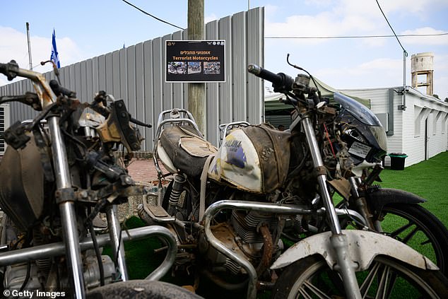 Recovered motorcycles used by Hamas members during the October 7 attacks are on display at an IDF exhibition