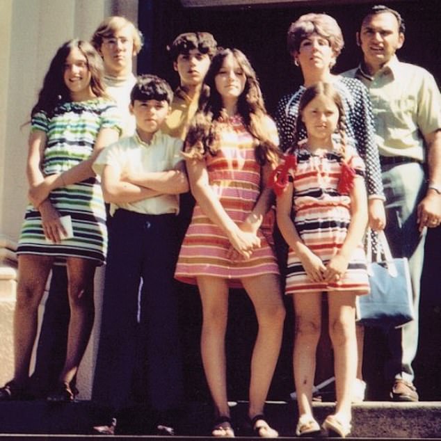 Madonna, center, in 1970 with, from left, sister Paula, uncle Chris, brothers Christopher and Marty, sister Melanie, stepmother Joan and father Silvio