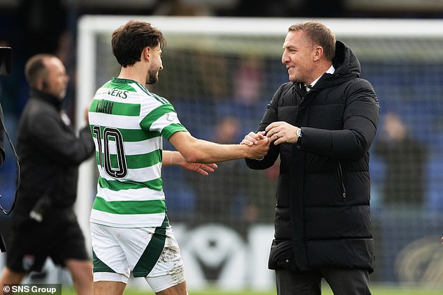 Celtic boss Rodgers congratulates Kuhn on dramatic late goal