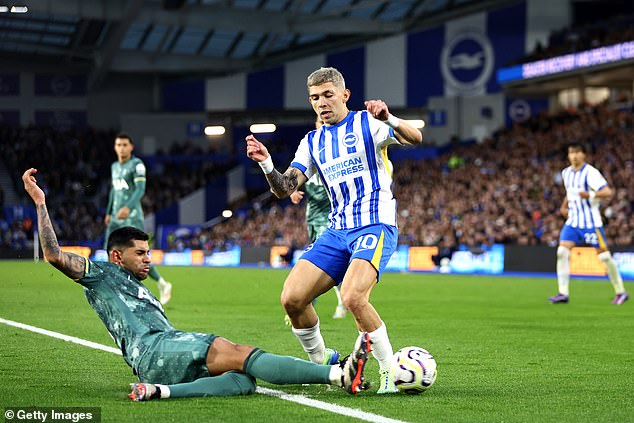 Spurs centre-back Cristian Romero was pictured sliding into Brighton substitute Julio Enciso