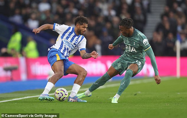 Tottenham's inverted left-back Destiny Udogie (right) pictured trying to tackle Rutter (left)