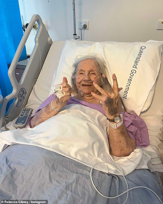 Rebecca posted a photo of her mother lying in a hospital bed, smiling and giving a thumbs up. She wrote: 'Nothing broken except a few cracks and bruises'