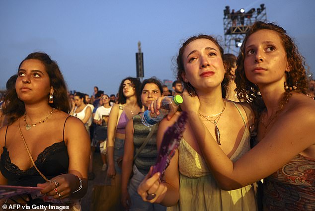 Survivors and relatives of revelers who tragically died at the Nova Festival during the deadly Hamas raid on October 7 to commemorate the victims during a memorial concert