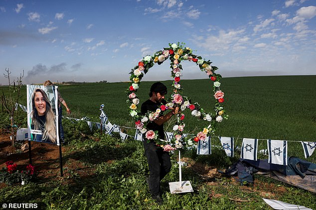 The family of Liraz Assulin, 38, who fled the Nova festival, creates a memorial for her, near Kibbutz Kfar Aza in southern Israel, January 21, 2024