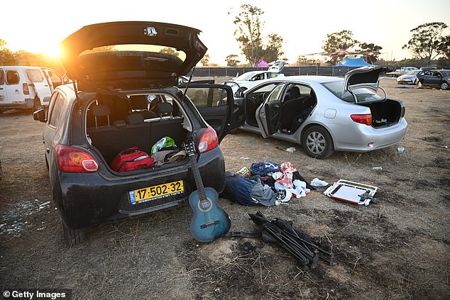 Destroyed cars and belongings left at the site of the Supernova Music Festival, where hundreds were killed and dozens taken by Hamas militants near the Gaza border, on October 12, 2023