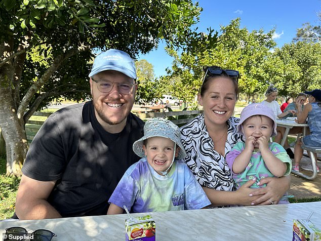 Cathy with husband Glenn, son George, five, and their daughter