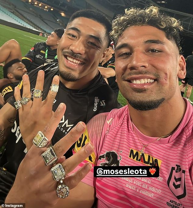 Moses Leota (left) and Izack Tago (right) also showed off their extensive collection of football jewelry, signaling the team's confidence in victory