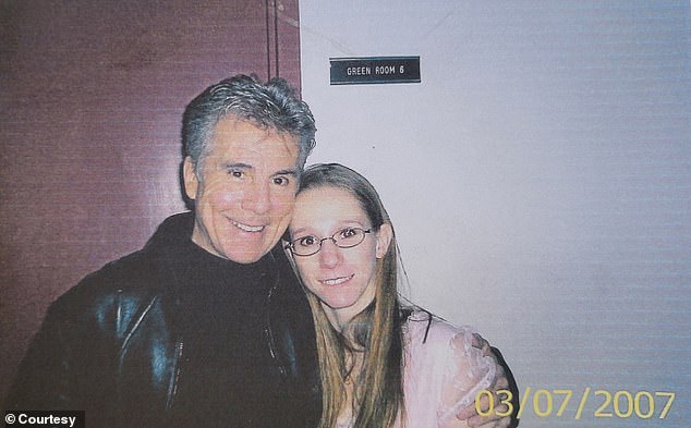 Mullenberg pictured with America's Most Wanted host John Walsh