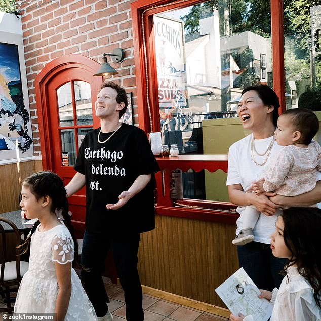 The family is seen together this summer celebrating Zuckerberg's 40th birthday