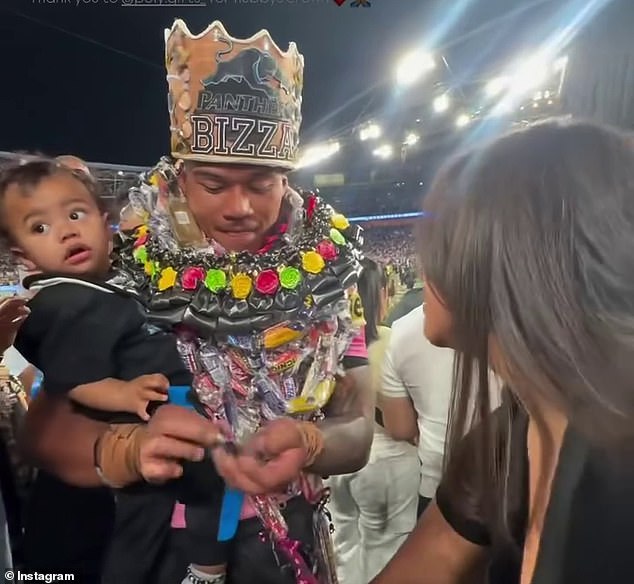 Brian To'o was presented with a crown by his wife after the thrilling NRL final