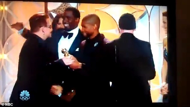 As they took the stage to accept their awards, U2's guitarist The Edge, 63, seemed content to hug Combs. Then the disgraced rapper turned to hug Bono and appeared to lean in to give him a kiss on the cheek. At the last minute, the rock star seemingly backed out and turned to the microphone to deliver their acceptance speech