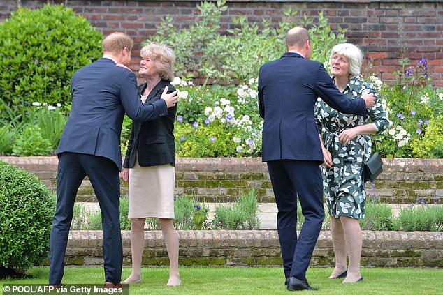 William and Harry hug their aunts at the unveiling of the statue of their mother, Princess Diana, at Kensington Palace in 2021