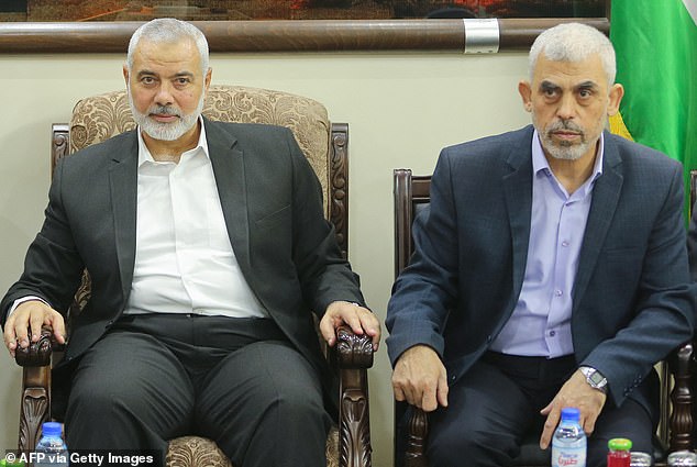 In July, the leader of Hamas's political wing, Ismail Haniyeh, was blown up when he visited Tehran to attend the inauguration of the Iranian president. Pictured with Sinwar in 2019