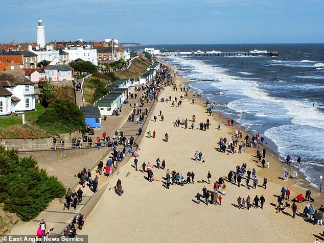 The annual meeting in the seaside town of Southwold, Suffolk, consisted of a mile walk from the harbor to Southwold Pier, with some dogs venturing into the sea