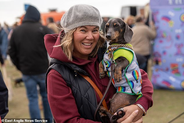 Sarah Waddoups (pictured) who traveled from Alfreton, Derbyshire, with her 11-year-old sausage dog Lord William, said: 'This is a great day out. It's fantastic to walk along the beach and meet so many lovely people and their dogs'