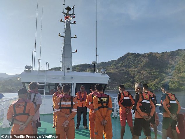 Rescuers are photographed during the multi-day search for Monfore