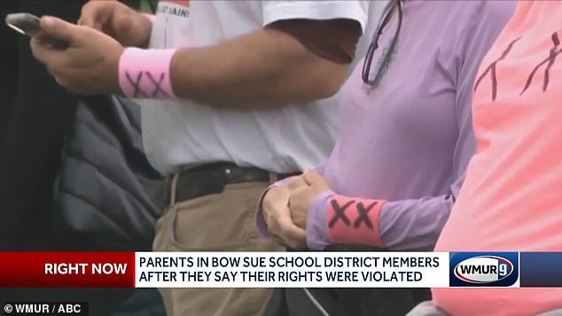 Some supporters even wore their own pink armbands to another football match