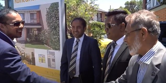 Mr Islame's Maserati was later seized after the liquidation order in a manner he found 'humiliating', the judgment said (Mr Islame is pictured with former colleagues on the far left)