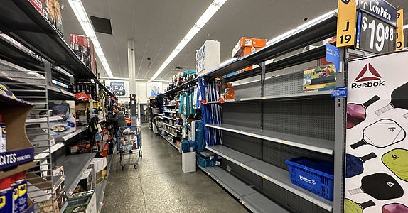 Empty shelves at the Walmart on Cattlemen Road in Sarasota Monday morning as residents stock up on water and supplies in anticipation of Hurricane Milton.