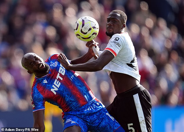 Ibrahima Konate (right) was the hidden identity as he headed to France after playing for Liverpool against Crystal Palace on Saturday