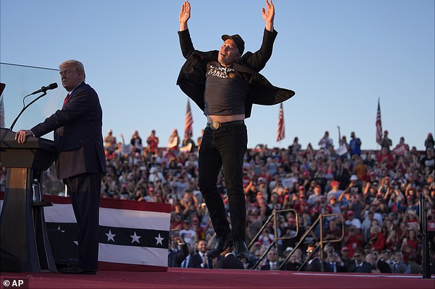 His appearance at the game came a day after he joined Donald Trump on stage at a rally