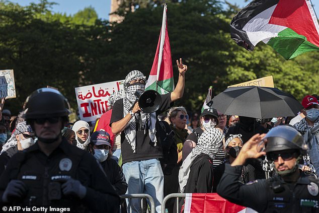 People at an encampment on the University of Washington campus protest the university's ties to Israel and Boeing in Seattle, May 12, 2024