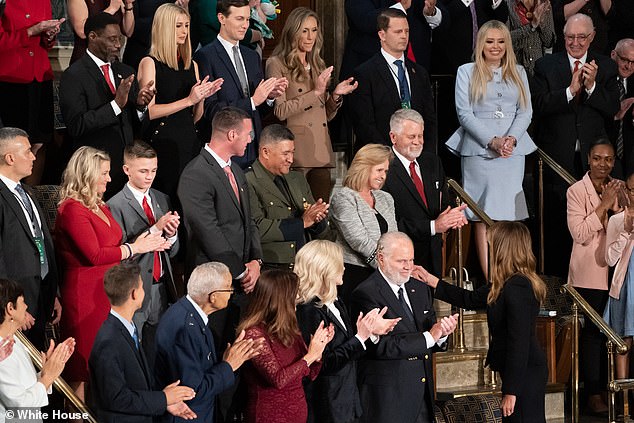 Melania Trump shakes hands with Marsha Mueller, Kayla Mueller's mother, during President Donald Trump's 2020 State of the Union address