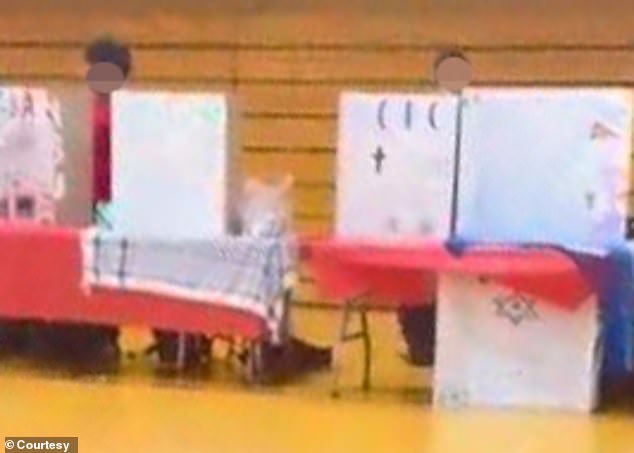 A video recording showing the Muslim Student Union table with the keffiyeh display, but the Jewish Student Union table had to remove the Israeli flag and yellow ribbon