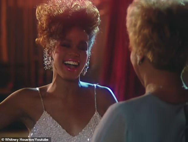 In a heartfelt moment near the end, Whitney joyfully embraces Cissy, who is standing in the wings