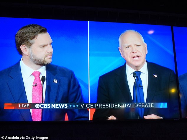 Governor Tim Walz (right) first used the term 