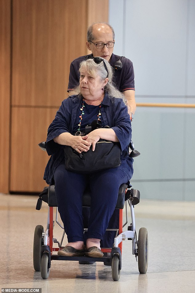 The Australian actress, 71, was driven through the airport by airline staff after getting off the plane