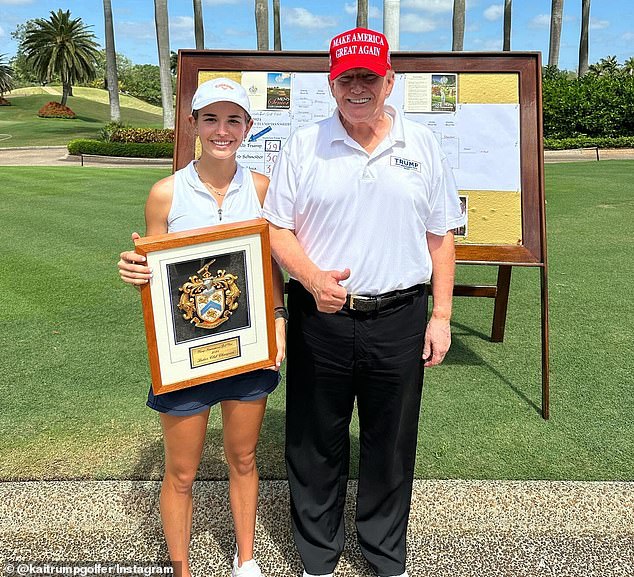 Kai posed with her grandfather, Donald Trump, with an award she won for golf