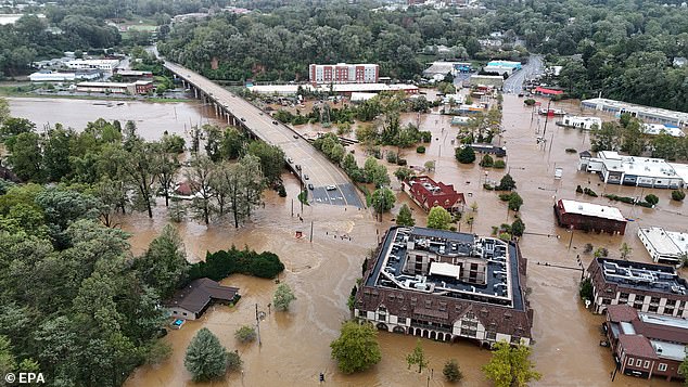 At least 227 people have died as a result of Hurricane Helene (pictured in Asheville, North Carolina), while FEMA has come under scrutiny for its response