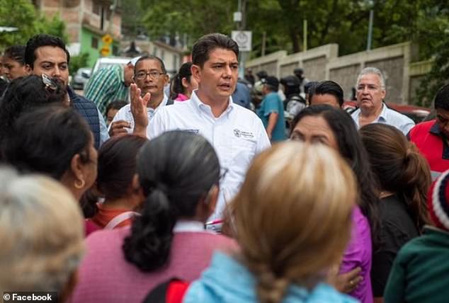 Hours before he was killed Sunday, Mayor Alejandro Arcos visited neighborhoods in Chilpancingo affected by last month's Hurricane John.