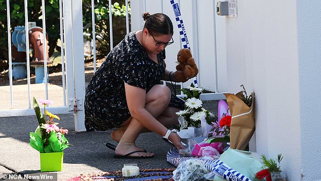 Letters and flowers in tribute to eight-year-old Raven have been left at the scene (pictured)