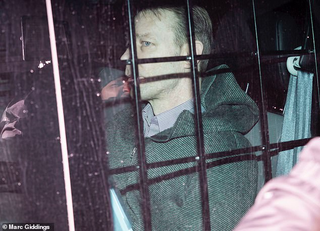 Christian Brueckner was pictured pulling up in a prison van outside the courtroom in Brunswick, Lower Saxony, at the start of his trial.