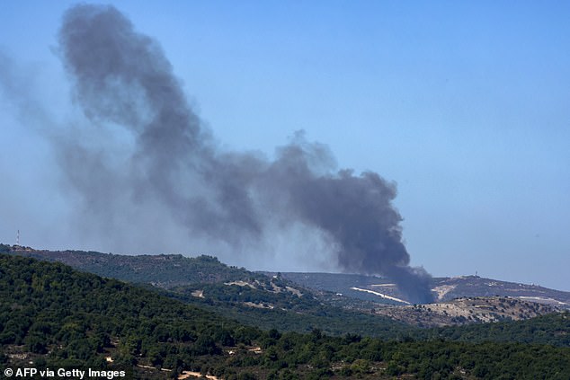 A photo taken on October 8, 2024, from a position in northern Israel, near the border with Lebanon, shows clouds of smoke after an Israeli bombardment of Lebanese territory